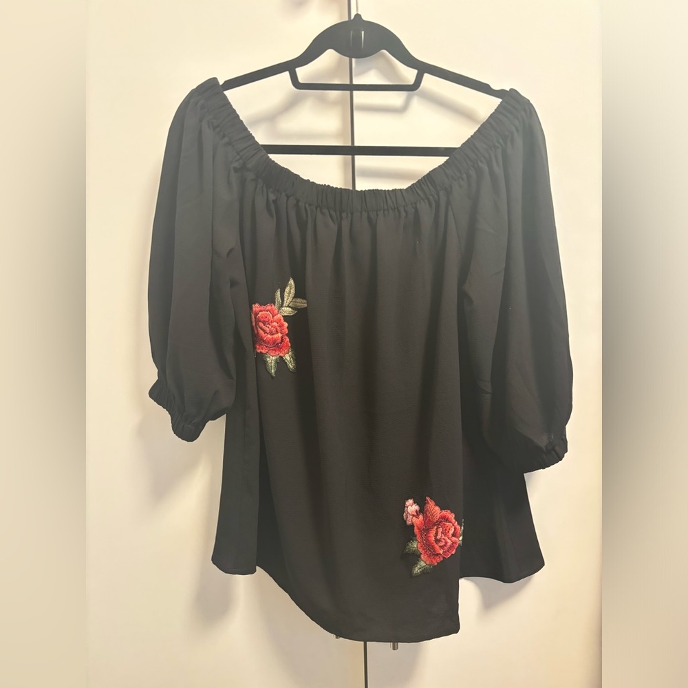 Off-shoulder flow top with roses